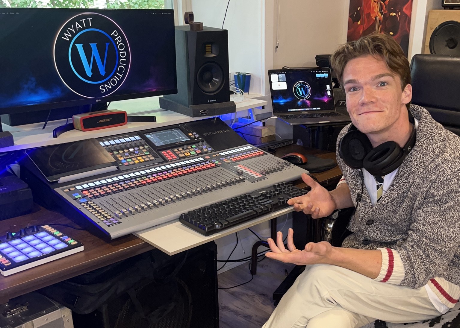 Jon Wyatt in the Wyatt Productions studio beside the StudioLive console and monitors
